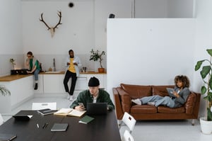 This is an image of people working in a casual co-working space