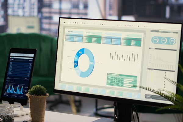 This is an image of two dashboards shown on a monitor and tablet