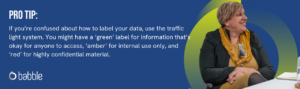 This graphic visually represents a "pro tip" to use a traffic light system to label your data and features an image of a woman smiling.