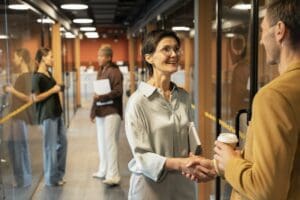 People meeting in office and shaking-hands