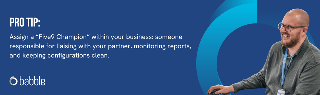 This graphic visually represents a "pro tip" that advises you to assign a “Five9 Champion” within your business and features an image of a man smiling at a desk.