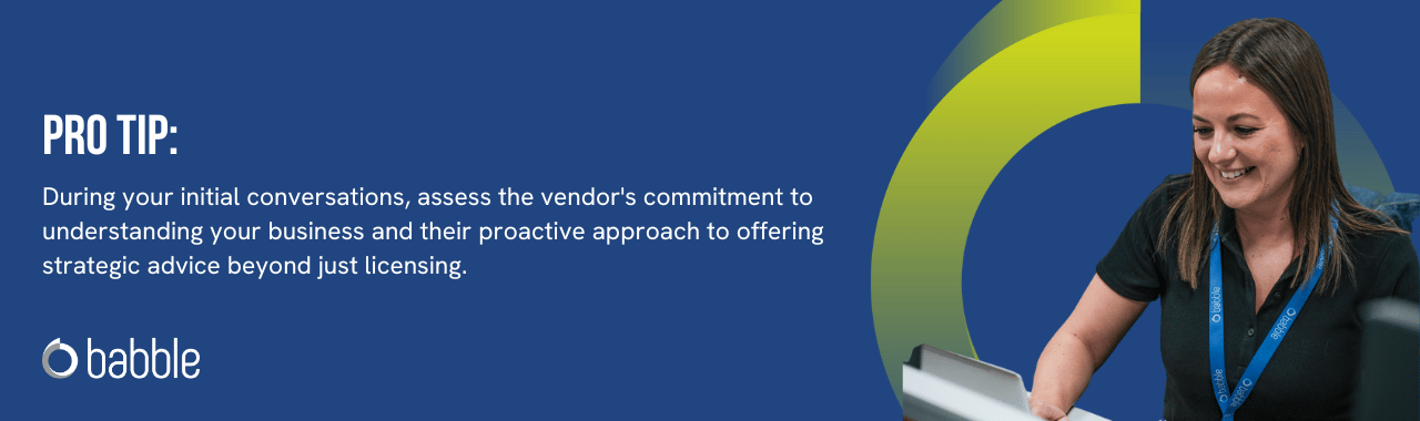 This graphic visually represents a "pro tip" to assess your Microsoft vendor's commitments to offer strategic advice beyond licensing and features an image of a lady smiling at a desk.