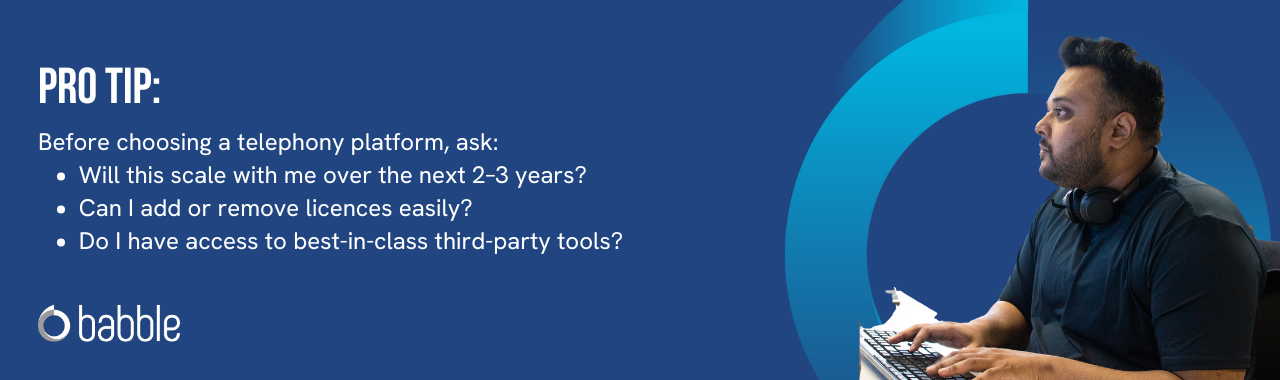 This graphic visually represents a "pro tip" to ensure that your telephony system can scale with your growing business and features an image of a man working at a desk.