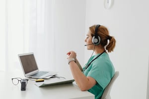This is an image of a doctor on a virtual call with a patient.