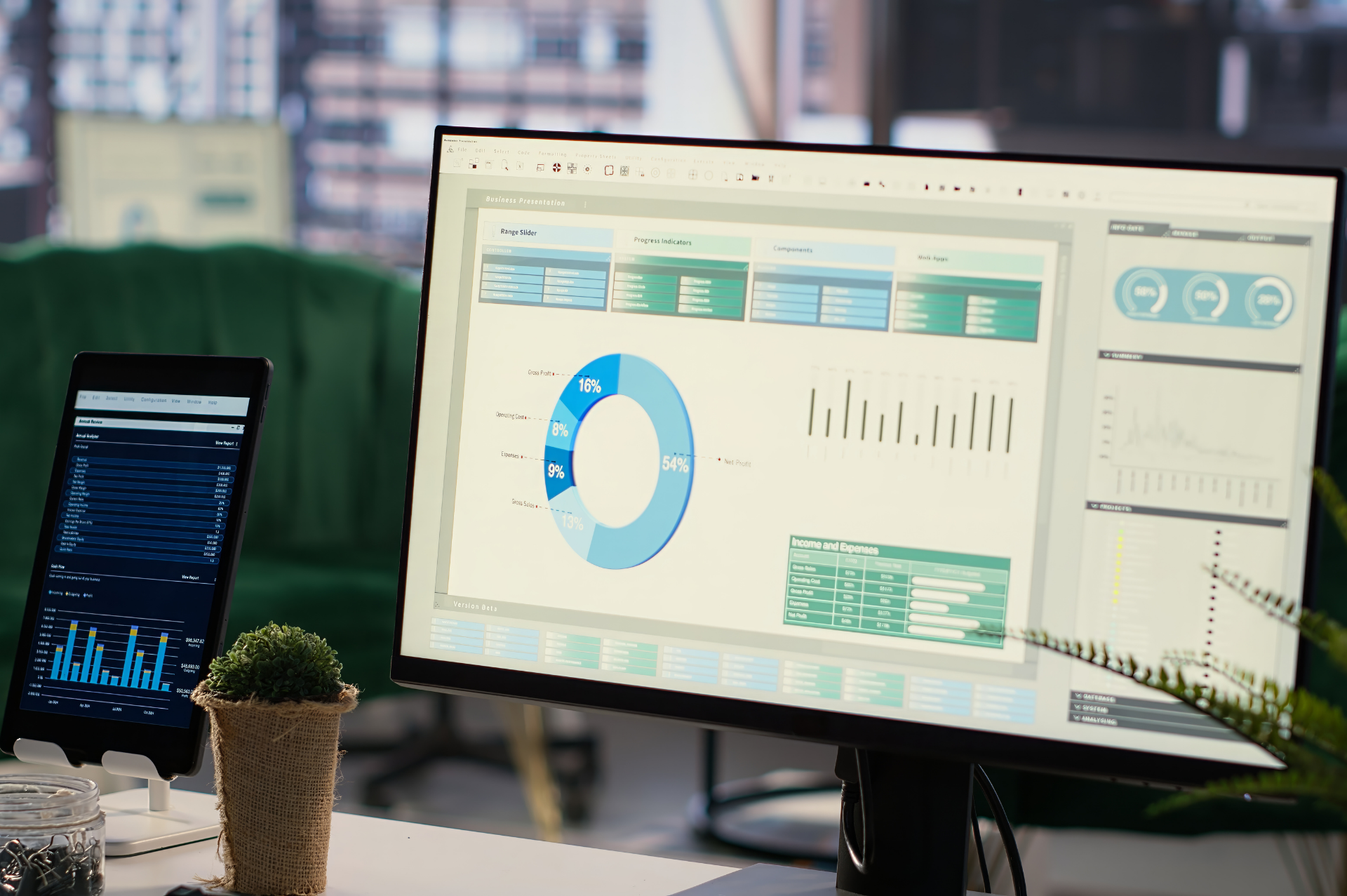 This is an image of two dashboards shown on a monitor and tablet