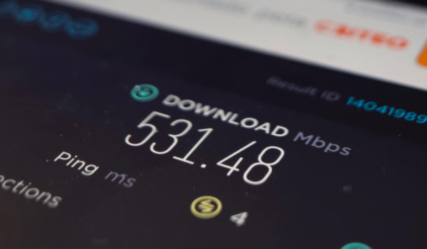 This is an image of a phone with the broadband download speed being shown on the screen.
