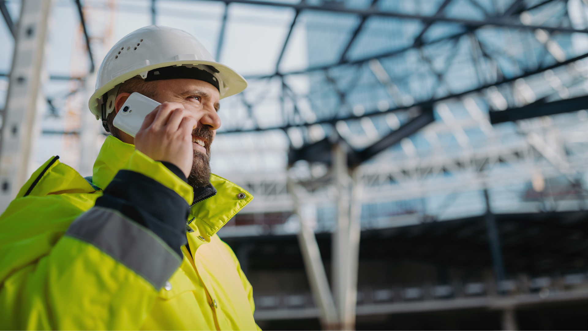 This is an image of a blue-collar worker on the phone.